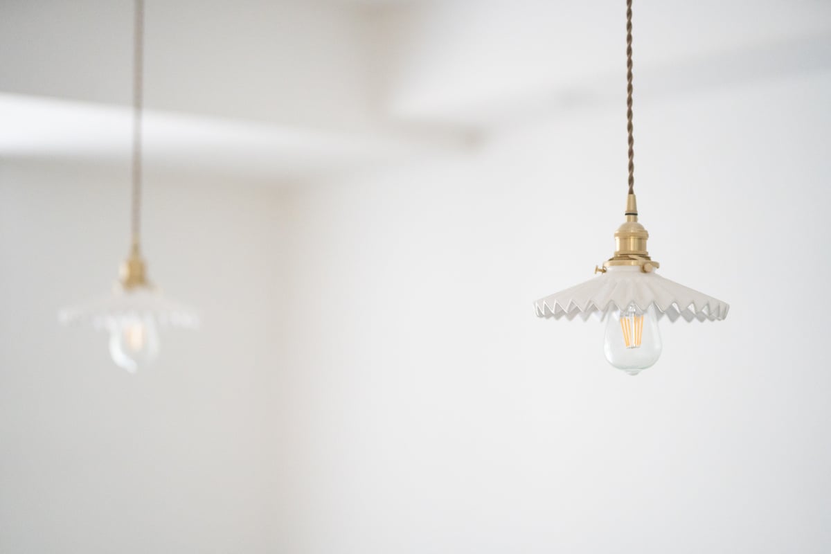 Two Copper-colored Pendant Lamps